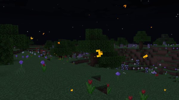 Orange fireflies at night